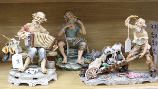 Three large Capodimonte figures signed Mollica, including a seated fisherman with pipe and catch,