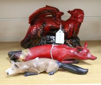 Three Doulton flambe figures, 2 foxes and a dragon