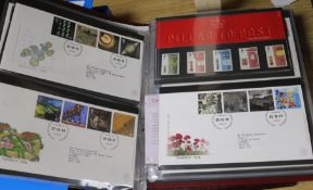 A collection of British and Zimbabwe stamps including first day covers