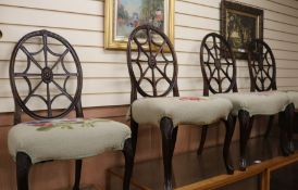 A set of six spider web back dining chairs (5 + 1)