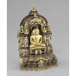 An Indian bronze and silver inlaid Jain shrine, dated 1471, cast with the figure of Tirthankara