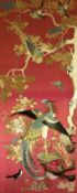 A Chinese embroidered silk 'bird' panel, decorated with birds and flowers, 101 x 44cm, framed