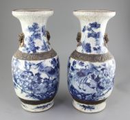 A pair of large Chinese blue and white crackle-glaze vases, c.1900, each painted with phoenixes amid