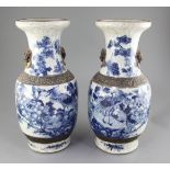 A pair of large Chinese blue and white crackle-glaze vases, c.1900, each painted with phoenixes amid
