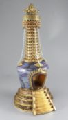 A large Chinese gilt bronze cloisonne enamel and lapis lazuli altar piece, the vase shaped body with