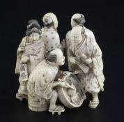 A good Japanese ivory okimono of five street pedlars or performers, signed Ikkosai, Meiji period,