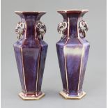 A pair of Chinese flambe glazed hexagonal baluster vases, 19th / early 20th century, the necks