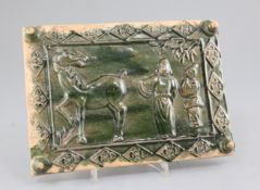 A Chinese green glazed pottery rectangular tile, moulded in relief with a Chinese scholar, attendant