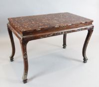 A Chinese carved and inlaid hardwood altar table, decorated throughout with warriors in a landscape,