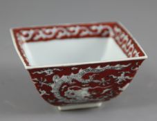 A Chinese iron-red and black enamelled 'dragon' square bowl, Jiajing mark and perhaps of the period,