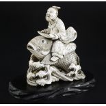 A Japanese ivory okimono of Kinko riding a carp, signed Ichyosen Naohide, 19th century, carved