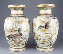 A pair of large Japanese Satsuma pottery vases, late 19th century, signed Kinkozan, each painted