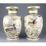 A pair of large Japanese Satsuma pottery vases, late 19th century, signed Kinkozan, each painted