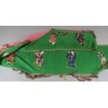 A Chinese green fabric banner panel, early 20th century, embroidered in silk with eight figures of