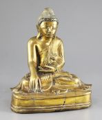 A Burmese bronze seated figure of Buddha, 19th / 20th century, with mirrored glass mosaic inlay to