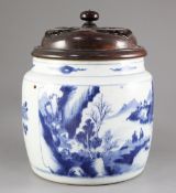A Chinese blue and white jar, 18th century, painted with shaped reserves of Antiques and two sages