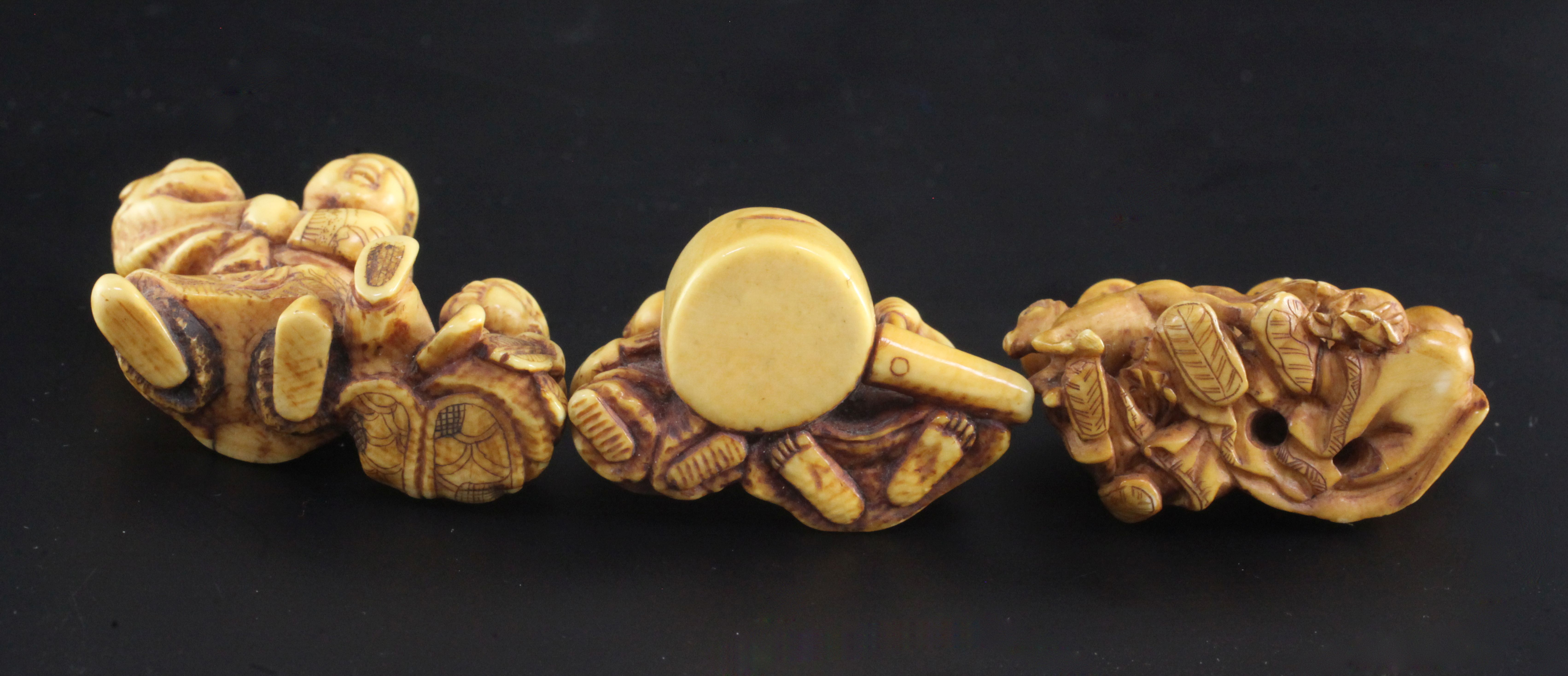 Three Japanese ivory netsuke of children, 19th century, the first modelled with two boys with a - Image 3 of 3