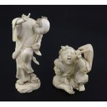 Two Japanese ivory okimono, Meiji period, the first carved as a seated boy holding a fan,