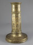 A Persian bronze and silver inlaid torch stand, 18th / 19th century, with repousse work decoration