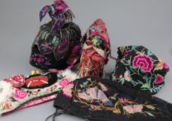 A group of Ethnic Chinese embroidered silk hats including a 'cockerel' hat