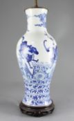 A Chinese blue and white 'mythical beasts' baluster vase, late 19th century/early 20th century,