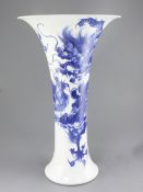 A large Japanese blue and white trumpet shaped vase, by Makuzu Kozan II (Miyagawa Hanzan, 1858-