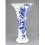 A large Japanese blue and white trumpet shaped vase, by Makuzu Kozan II (Miyagawa Hanzan, 1858-
