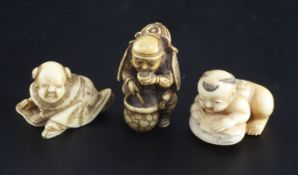 Three Japanese ivory netsuke, 19th century, the first of a Samurai drinking broth from a pot,
