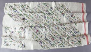 A Chinese embroidered silk collar pattern panel, with diagonal strips of figures in landscapes and a