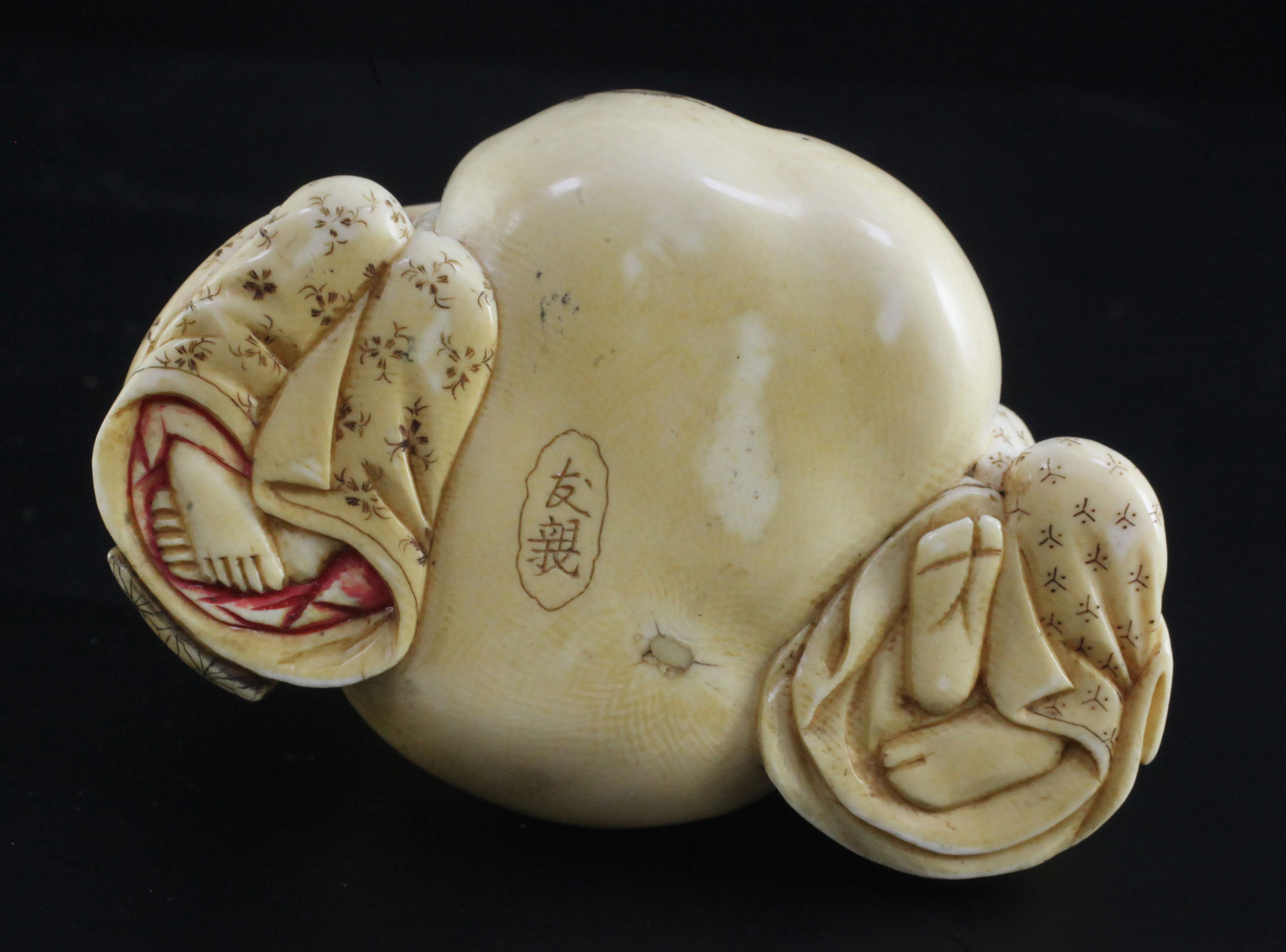 A Japanese ivory okimono of a man and woman holding the cords of a tied sack between them, Meiji - Image 3 of 3