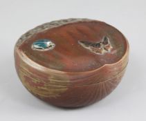 A Japanese patinated bronze and enamel box and cover, modelled as a chestnut, Meiji period, the
