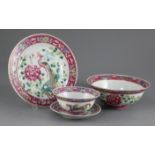 A group of Chinese Straits famille rose 'phoenix and peony' bowls and plates, c.1900, comprising