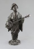 A Japanese bronze figure of a lady playing a shamisen, 19th century, standing on a naturalistic base