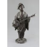 A Japanese bronze figure of a lady playing a shamisen, 19th century, standing on a naturalistic base