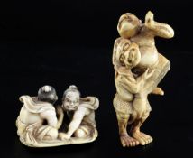 Two Japanese ivory netsuke of wrestlers, 19th century, the first of two arm wrestlers seated on a