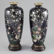 A pair of Japanese silver wire cloisonne enamel ovoid vases, Meiji period, both decorated with
