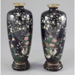 A pair of Japanese silver wire cloisonne enamel ovoid vases, Meiji period, both decorated with