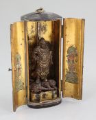 A Japanese lacquer 'Zushi' (portable shrine), 19th century, housing a parcel gilt hardwood figure of