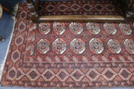 A Turkish blue and red rug