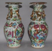 A pair of Chinese Famille Rose 'twin fish' vases, 19th Century