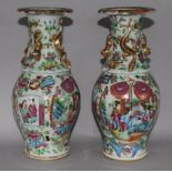 A pair of Chinese Famille Rose 'twin fish' vases, 19th Century