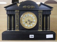 A black slate classical clock