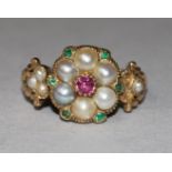 A late Victorian gold and gem set cluster ring, size M.