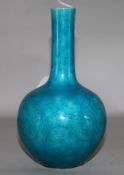 A Chinese turquoise glazed bottle vase, incised with dragons