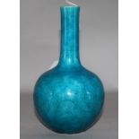 A Chinese turquoise glazed bottle vase, incised with dragons