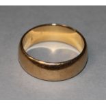 An 18ct gold wedding band, 8.5 grams, size R.