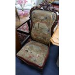 A Victorian needlepoint salon chair