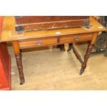 An Edwardian walnut writing table, W.114cm