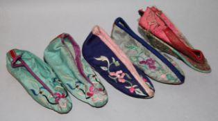 A pair of embroidered silk Chinese shoes and 3 others