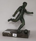 An Art Deco footballers on a marble base